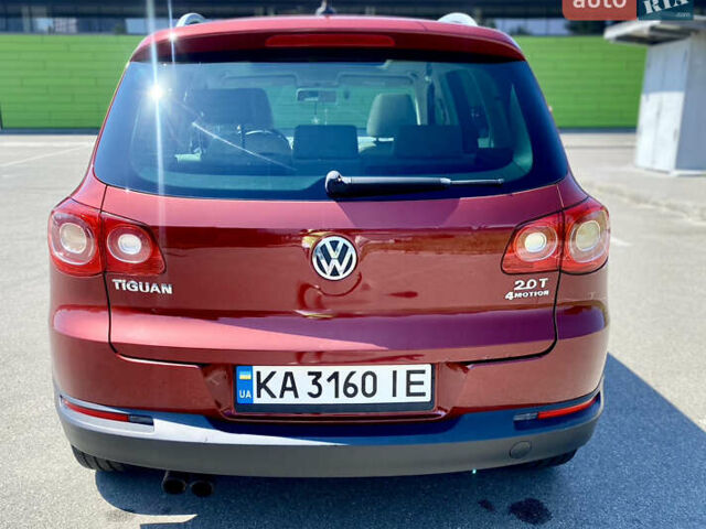 Красный Фольксваген Тигуан, объемом двигателя 1.98 л и пробегом 270 тыс. км за 10800 $, фото 3 на Automoto.ua