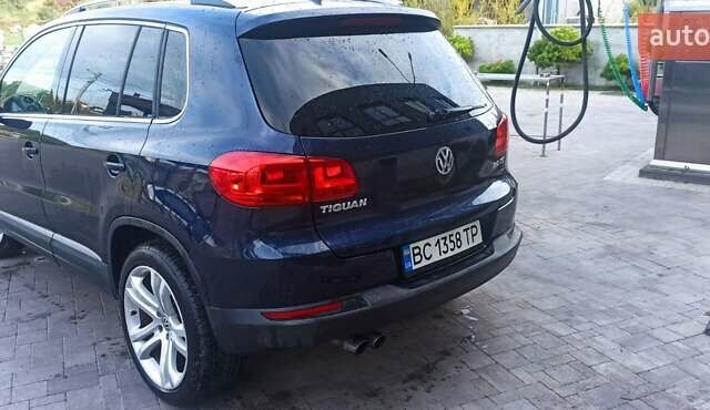 Червоний Фольксваген Тігуан, об'ємом двигуна 1.98 л та пробігом 182 тис. км за 12000 $, фото 9 на Automoto.ua