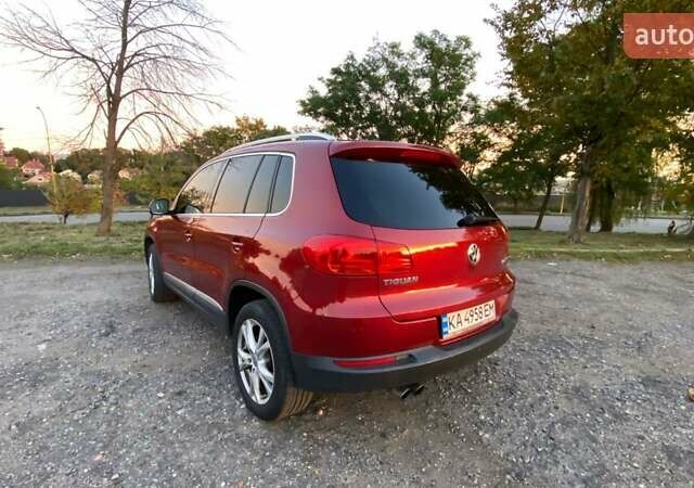 Красный Фольксваген Тигуан, объемом двигателя 1.98 л и пробегом 265 тыс. км за 10500 $, фото 7 на Automoto.ua