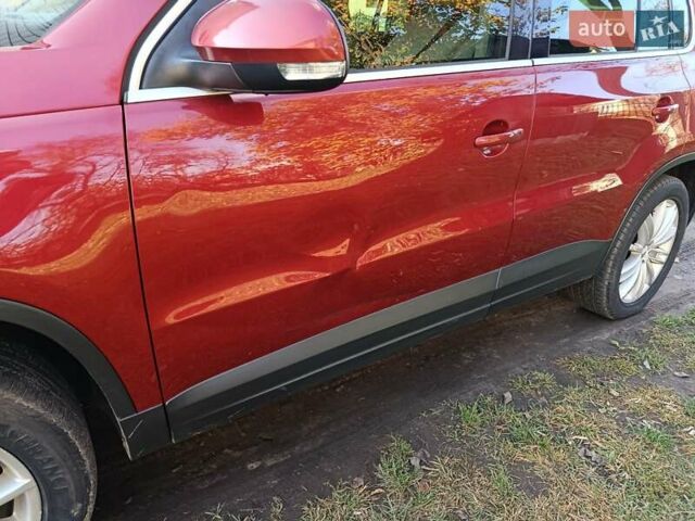 Красный Фольксваген Тигуан, объемом двигателя 1.98 л и пробегом 497 тыс. км за 9000 $, фото 14 на Automoto.ua