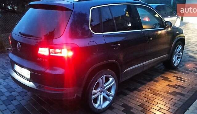 Червоний Фольксваген Тігуан, об'ємом двигуна 1.98 л та пробігом 182 тис. км за 12000 $, фото 19 на Automoto.ua