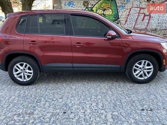 Красный Фольксваген Тигуан, объемом двигателя 0 л и пробегом 200 тыс. км за 9800 $, фото 1 на Automoto.ua