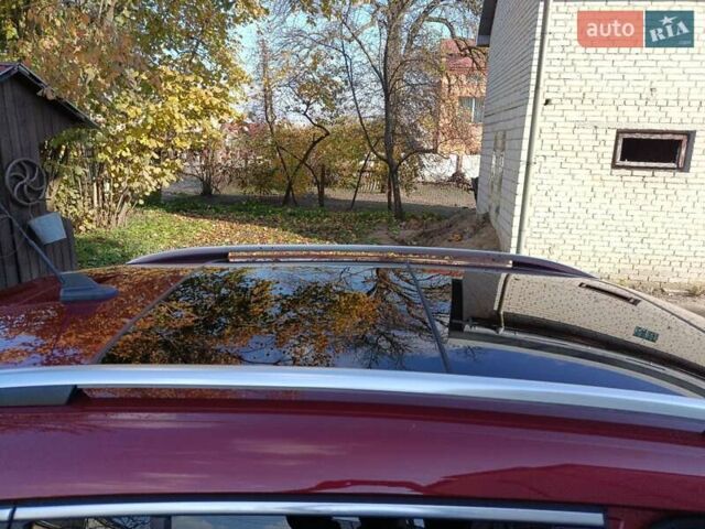 Красный Фольксваген Тигуан, объемом двигателя 1.98 л и пробегом 497 тыс. км за 9000 $, фото 5 на Automoto.ua