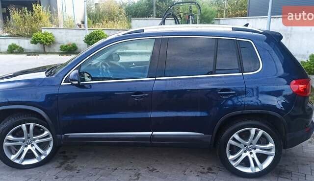 Червоний Фольксваген Тігуан, об'ємом двигуна 1.98 л та пробігом 182 тис. км за 12000 $, фото 7 на Automoto.ua