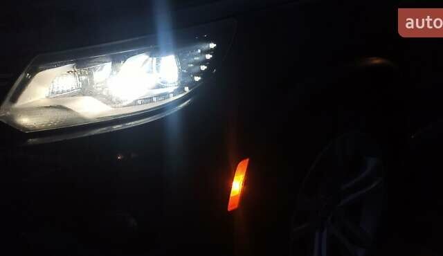 Червоний Фольксваген Тігуан, об'ємом двигуна 1.98 л та пробігом 182 тис. км за 12000 $, фото 13 на Automoto.ua