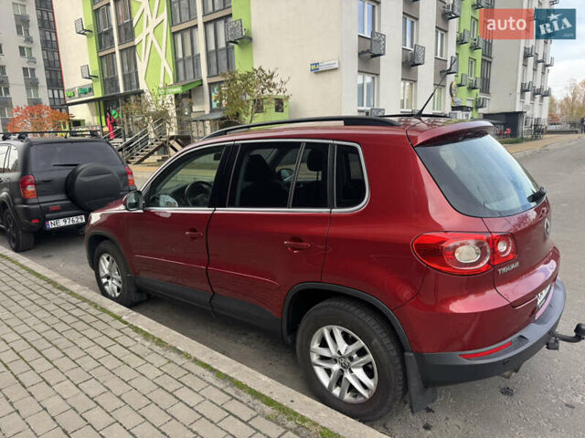 Красный Фольксваген Тигуан, объемом двигателя 1.97 л и пробегом 205 тыс. км за 12500 $, фото 3 на Automoto.ua