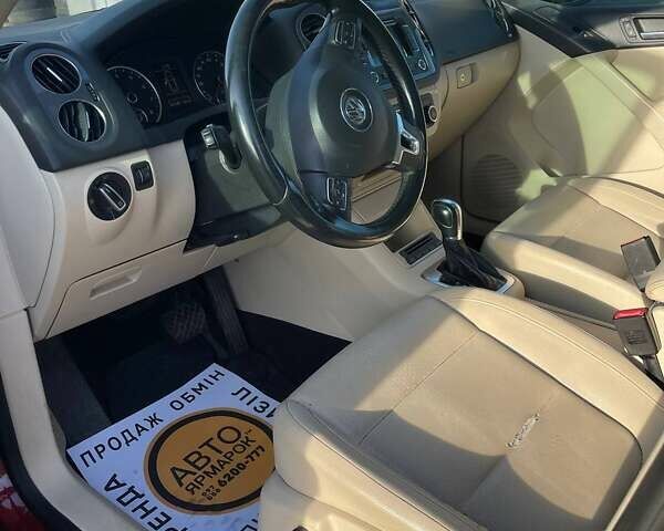 Красный Фольксваген Тигуан, объемом двигателя 1.98 л и пробегом 265 тыс. км за 9990 $, фото 14 на Automoto.ua