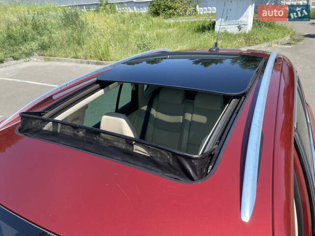 Красный Фольксваген Тигуан, объемом двигателя 1.98 л и пробегом 270 тыс. км за 10800 $, фото 9 на Automoto.ua