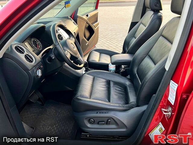 Красный Фольксваген Тигуан, объемом двигателя 2 л и пробегом 205 тыс. км за 13800 $, фото 10 на Automoto.ua