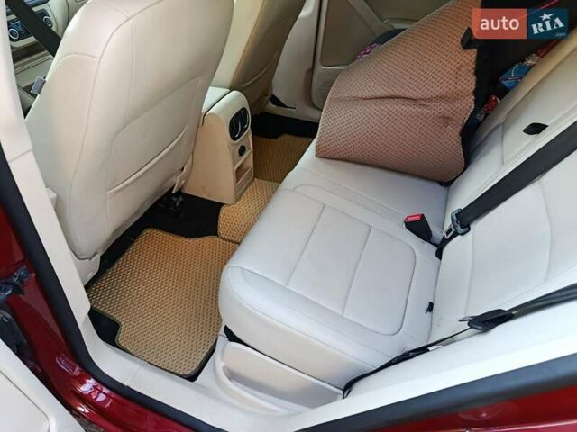 Красный Фольксваген Тигуан, объемом двигателя 1.98 л и пробегом 497 тыс. км за 9000 $, фото 2 на Automoto.ua