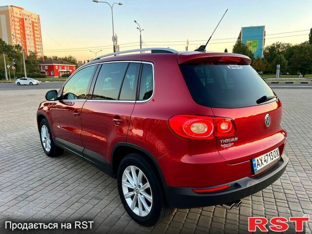 Красный Фольксваген Тигуан, объемом двигателя 2 л и пробегом 205 тыс. км за 13800 $, фото 7 на Automoto.ua