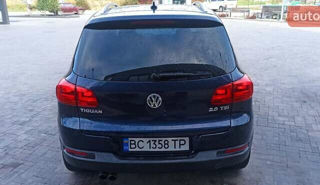 Червоний Фольксваген Тігуан, об'ємом двигуна 1.98 л та пробігом 182 тис. км за 12000 $, фото 5 на Automoto.ua