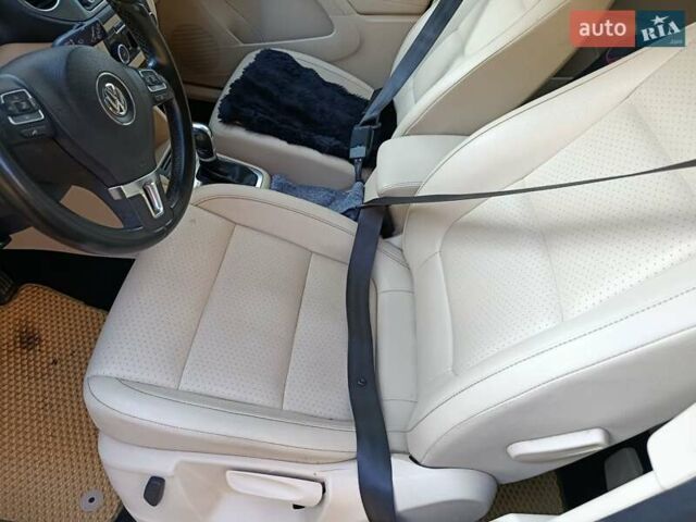 Красный Фольксваген Тигуан, объемом двигателя 1.98 л и пробегом 497 тыс. км за 9000 $, фото 3 на Automoto.ua