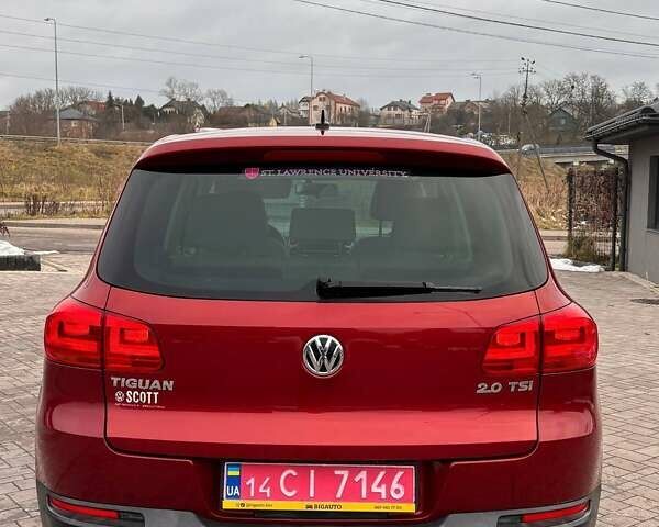 Красный Фольксваген Тигуан, объемом двигателя 2 л и пробегом 198 тыс. км за 8999 $, фото 5 на Automoto.ua