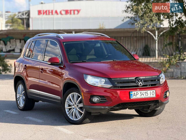 Красный Фольксваген Тигуан, объемом двигателя 1.98 л и пробегом 181 тыс. км за 12200 $, фото 1 на Automoto.ua