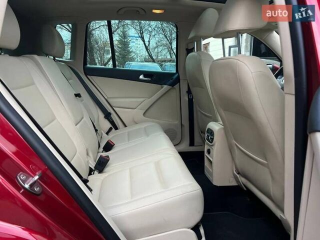 Красный Фольксваген Тигуан, объемом двигателя 1.98 л и пробегом 120 тыс. км за 11800 $, фото 24 на Automoto.ua