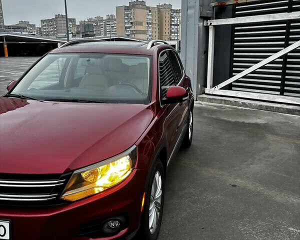 Красный Фольксваген Тигуан, объемом двигателя 1.98 л и пробегом 224 тыс. км за 11500 $, фото 1 на Automoto.ua