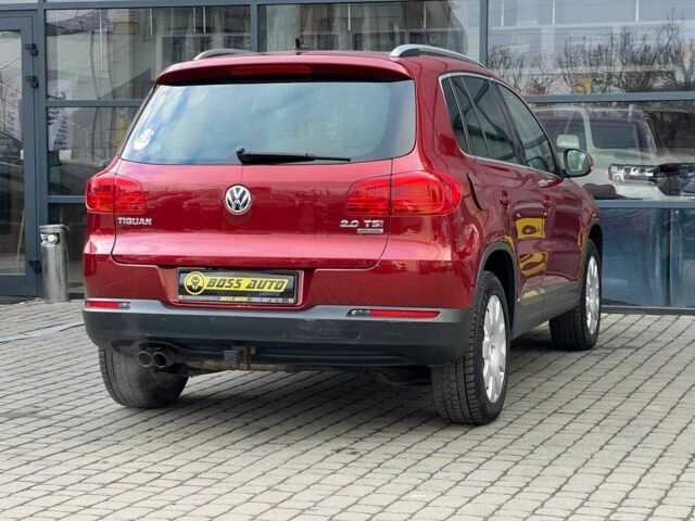 Червоний Фольксваген Тігуан, об'ємом двигуна 2 л та пробігом 120 тис. км за 11800 $, фото 6 на Automoto.ua