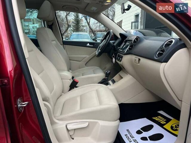 Красный Фольксваген Тигуан, объемом двигателя 1.98 л и пробегом 120 тыс. км за 11800 $, фото 22 на Automoto.ua