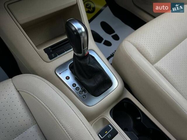 Красный Фольксваген Тигуан, объемом двигателя 1.98 л и пробегом 120 тыс. км за 11800 $, фото 20 на Automoto.ua