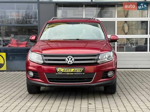 Красный Фольксваген Тигуан, объемом двигателя 1.98 л и пробегом 120 тыс. км за 11800 $, фото 1 на Automoto.ua