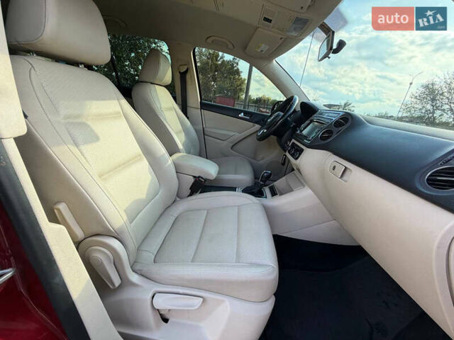 Красный Фольксваген Тигуан, объемом двигателя 1.98 л и пробегом 181 тыс. км за 12200 $, фото 17 на Automoto.ua