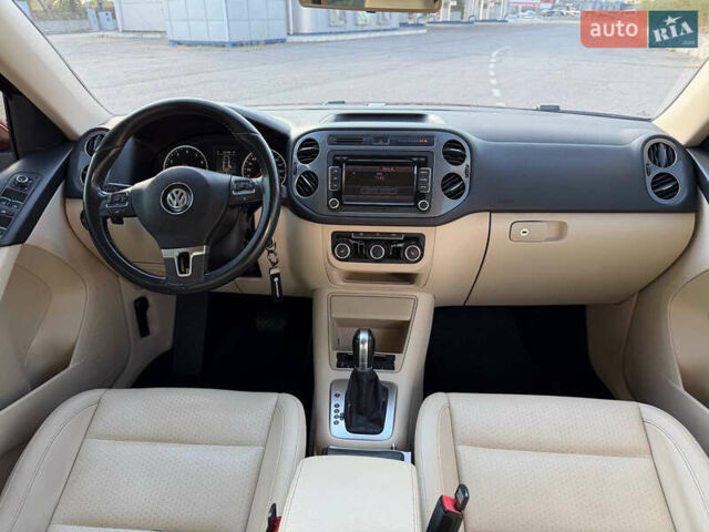 Красный Фольксваген Тигуан, объемом двигателя 1.98 л и пробегом 181 тыс. км за 12200 $, фото 13 на Automoto.ua