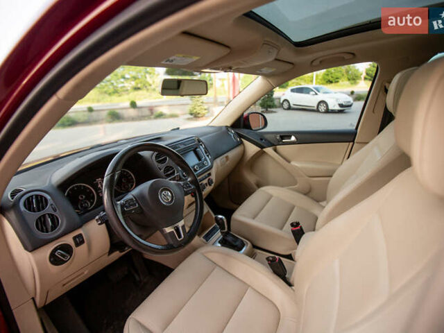 Красный Фольксваген Тигуан, объемом двигателя 1.98 л и пробегом 159 тыс. км за 13300 $, фото 23 на Automoto.ua