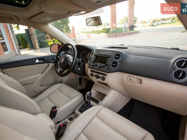 Красный Фольксваген Тигуан, объемом двигателя 1.98 л и пробегом 159 тыс. км за 13300 $, фото 22 на Automoto.ua