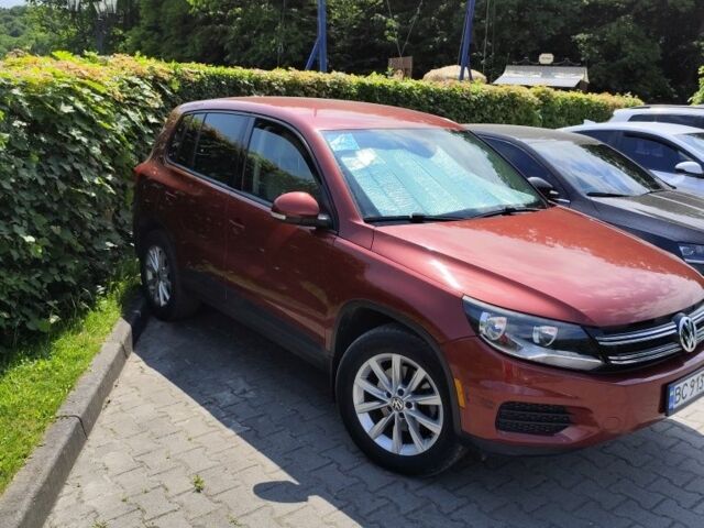 Красный Фольксваген Тигуан, объемом двигателя 2 л и пробегом 123 тыс. км за 267 $, фото 5 на Automoto.ua