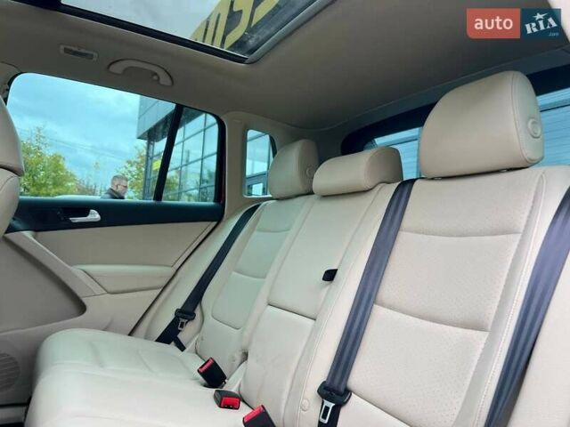 Красный Фольксваген Тигуан, объемом двигателя 1.98 л и пробегом 175 тыс. км за 13800 $, фото 16 на Automoto.ua