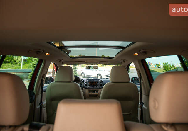 Красный Фольксваген Тигуан, объемом двигателя 1.98 л и пробегом 159 тыс. км за 13300 $, фото 26 на Automoto.ua