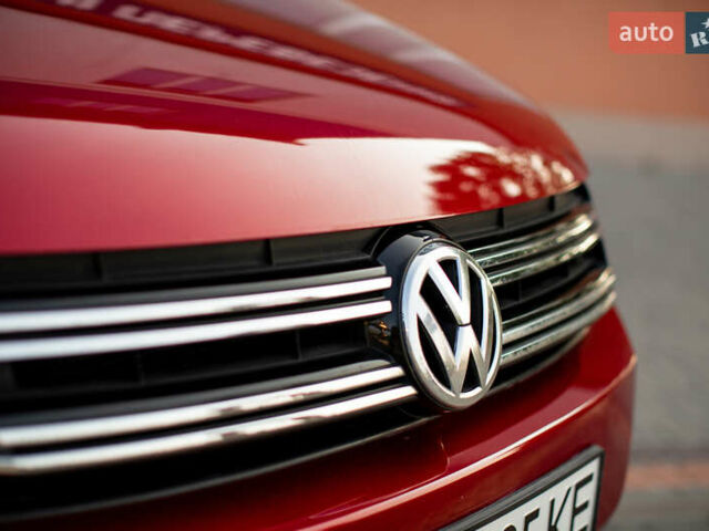 Красный Фольксваген Тигуан, объемом двигателя 1.98 л и пробегом 159 тыс. км за 13300 $, фото 2 на Automoto.ua