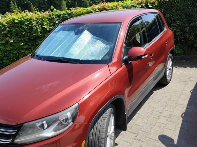 Красный Фольксваген Тигуан, объемом двигателя 2 л и пробегом 123 тыс. км за 267 $, фото 4 на Automoto.ua