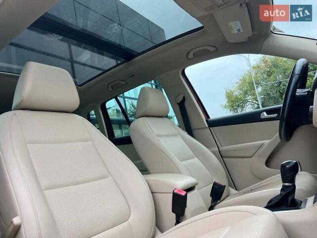 Красный Фольксваген Тигуан, объемом двигателя 1.98 л и пробегом 175 тыс. км за 13800 $, фото 7 на Automoto.ua