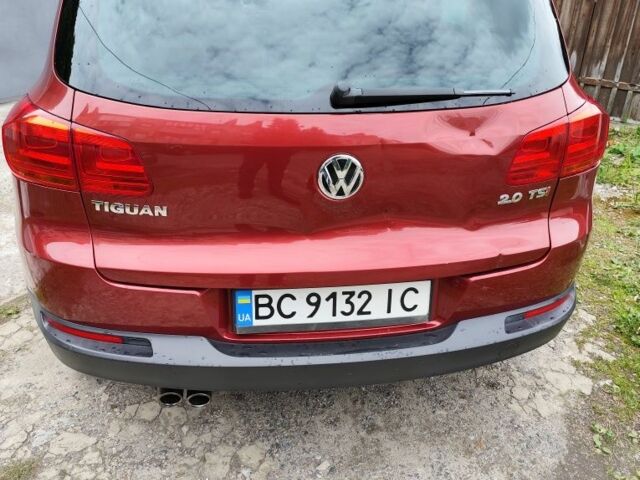 Красный Фольксваген Тигуан, объемом двигателя 2 л и пробегом 123 тыс. км за 267 $, фото 2 на Automoto.ua