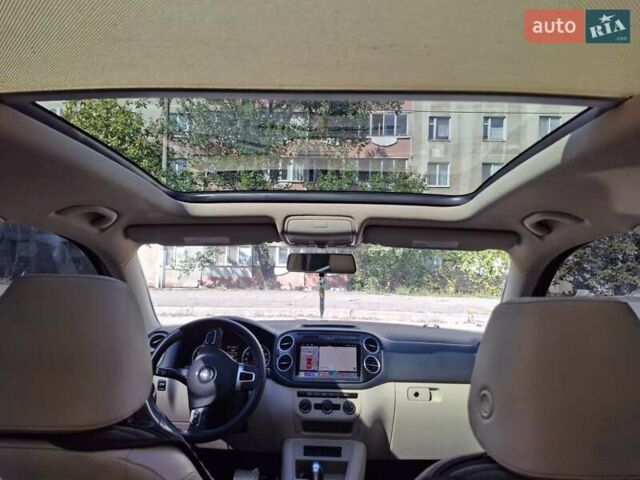 Красный Фольксваген Тигуан, объемом двигателя 1.98 л и пробегом 161 тыс. км за 14900 $, фото 6 на Automoto.ua