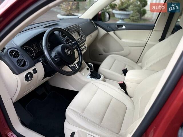 Красный Фольксваген Тигуан, объемом двигателя 1.98 л и пробегом 181 тыс. км за 13499 $, фото 46 на Automoto.ua