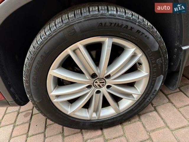 Красный Фольксваген Тигуан, объемом двигателя 1.98 л и пробегом 181 тыс. км за 13499 $, фото 83 на Automoto.ua