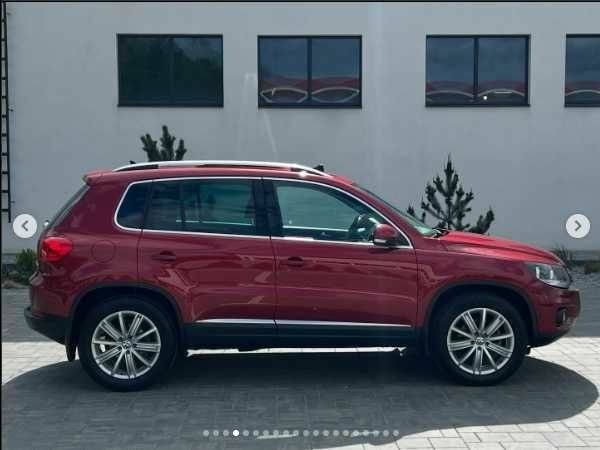 Красный Фольксваген Тигуан, объемом двигателя 2 л и пробегом 205 тыс. км за 12000 $, фото 3 на Automoto.ua