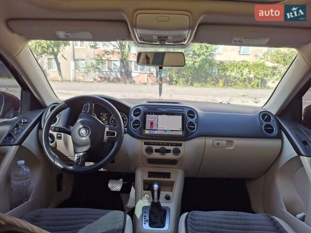 Красный Фольксваген Тигуан, объемом двигателя 1.98 л и пробегом 161 тыс. км за 14900 $, фото 2 на Automoto.ua