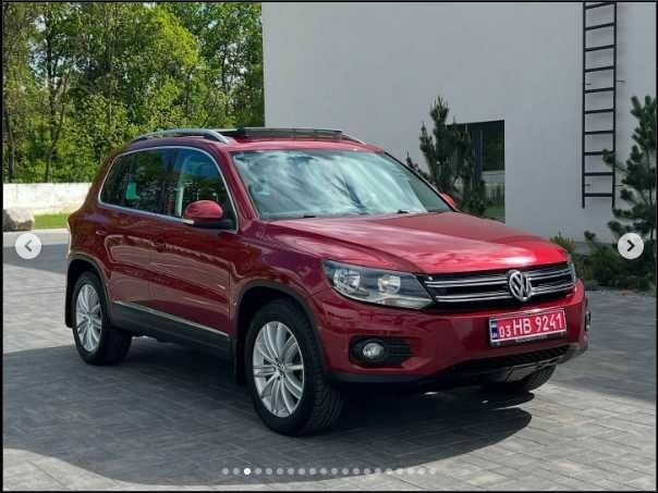 Красный Фольксваген Тигуан, объемом двигателя 2 л и пробегом 205 тыс. км за 12000 $, фото 2 на Automoto.ua