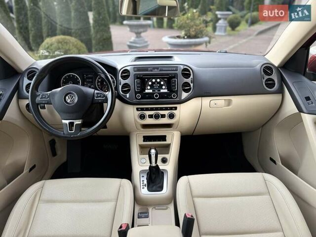 Красный Фольксваген Тигуан, объемом двигателя 1.98 л и пробегом 181 тыс. км за 13499 $, фото 61 на Automoto.ua