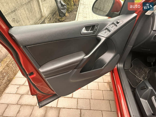 Червоний Фольксваген Тігуан, об'ємом двигуна 1.98 л та пробігом 167 тис. км за 11300 $, фото 11 на Automoto.ua