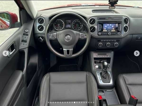 Красный Фольксваген Тигуан, объемом двигателя 2 л и пробегом 205 тыс. км за 12000 $, фото 11 на Automoto.ua