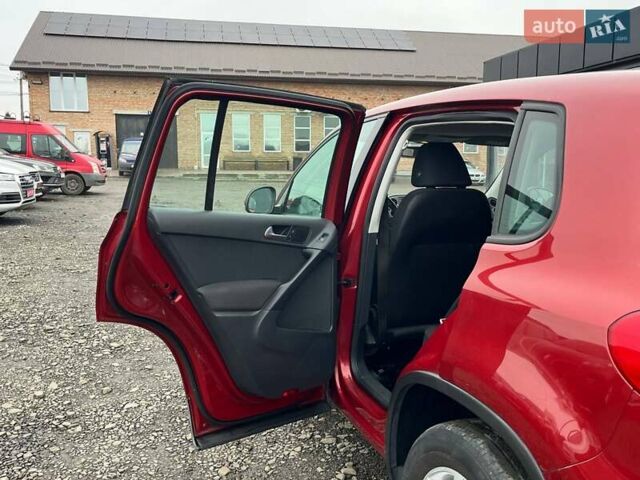 Червоний Фольксваген Тігуан, об'ємом двигуна 2 л та пробігом 142 тис. км за 7900 $, фото 17 на Automoto.ua