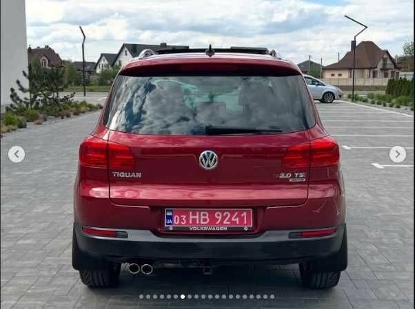 Красный Фольксваген Тигуан, объемом двигателя 2 л и пробегом 205 тыс. км за 12000 $, фото 6 на Automoto.ua