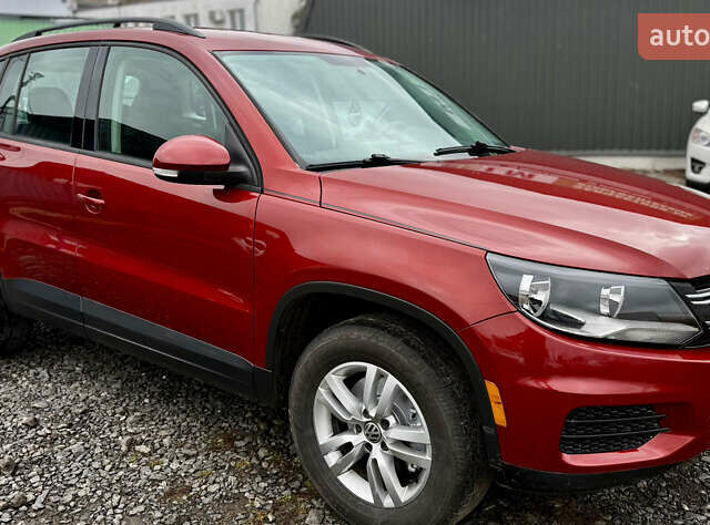 Червоний Фольксваген Тігуан, об'ємом двигуна 2 л та пробігом 140 тис. км за 11100 $, фото 2 на Automoto.ua