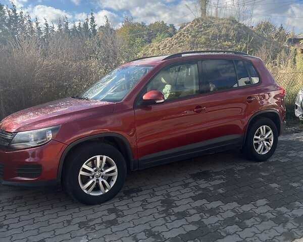 Красный Фольксваген Тигуан, объемом двигателя 1.98 л и пробегом 139 тыс. км за 14000 $, фото 1 на Automoto.ua