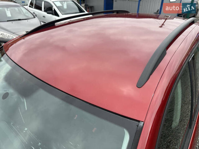 Червоний Фольксваген Тігуан, об'ємом двигуна 2 л та пробігом 140 тис. км за 11100 $, фото 22 на Automoto.ua